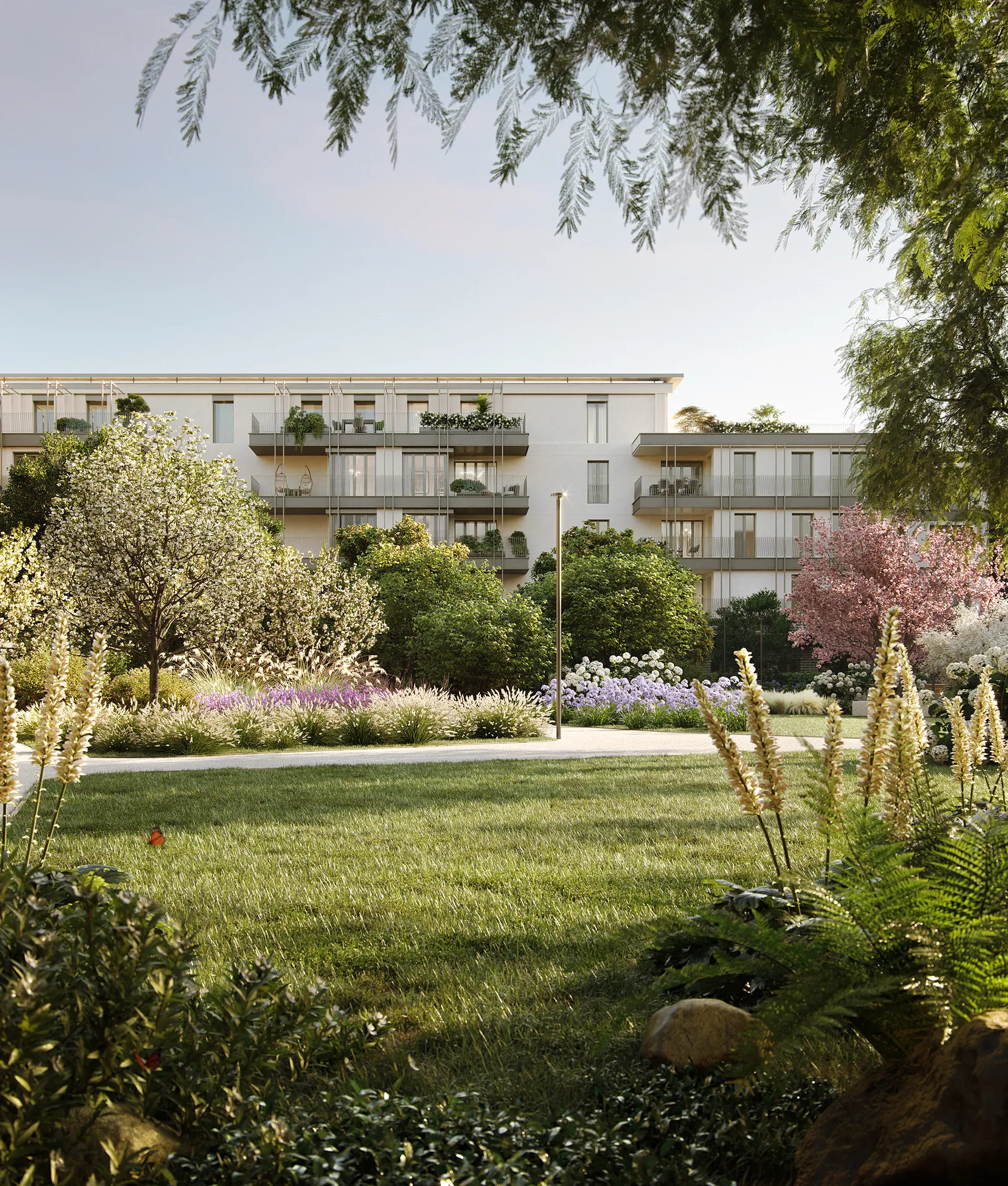 Veridia Living, elegante facciata circondata da un paesaggio verde privato, con logge ed elementi di design